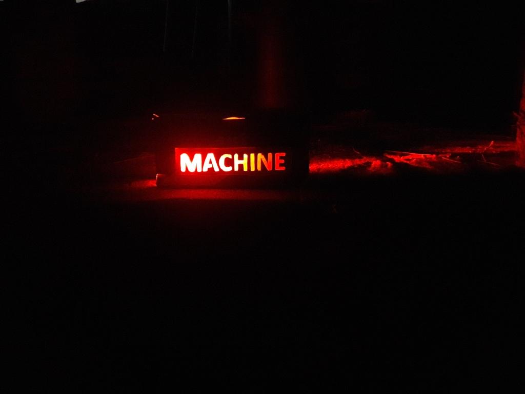 light box saying 'machine'