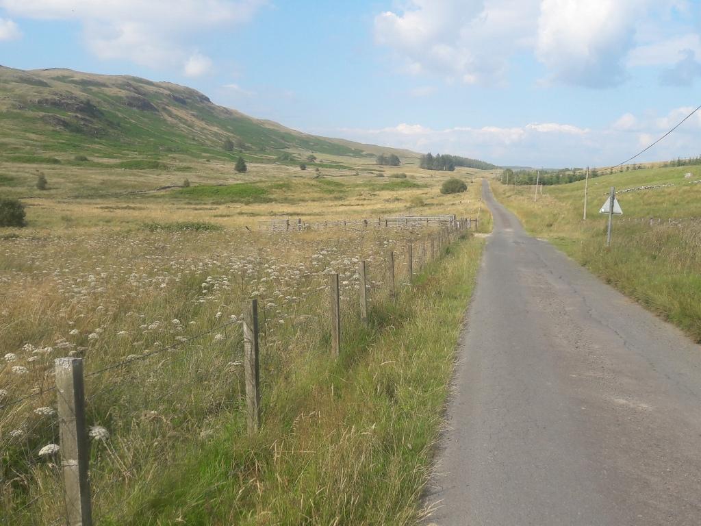 Empty road across moorland